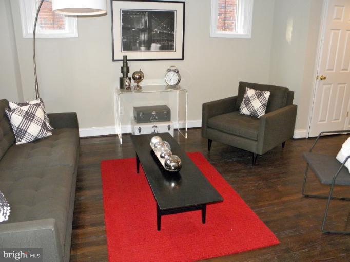3960 S Street Southeast Washington, DC 20020 - Photo 6 of 27 a living room with furniture and a wooden floor