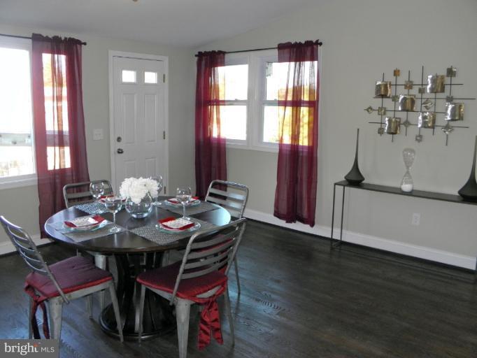 3960 S Street Southeast Washington, DC 20020 - Photo 7 of 27 a view of a dining room with furniture and window