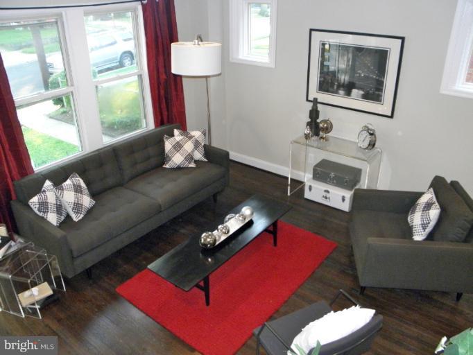 3960 S Street Southeast Washington, DC 20020 - Photo 9 of 27 a living room with furniture and a window