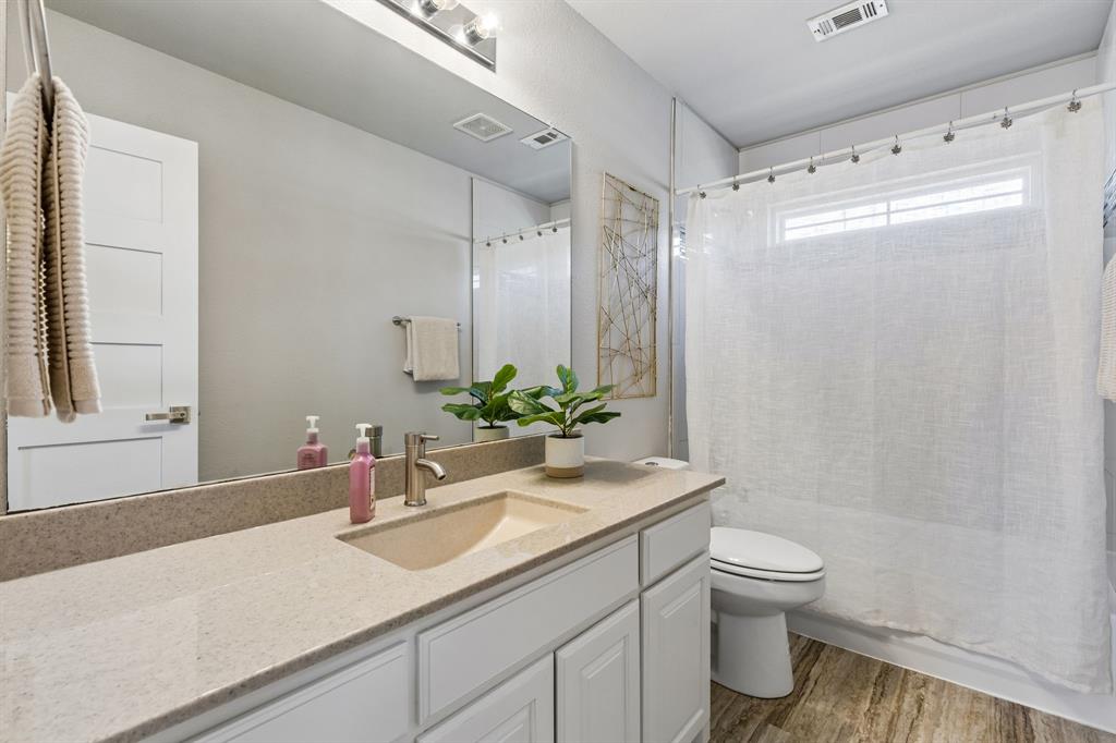 706 South Jupiter Road, Unit 307 Allen, TX 75002 - Photo 20 of 32 Shared bathroom with a tub