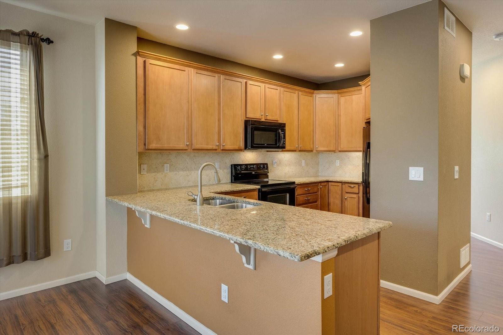 12804 Harrison Street Thornton, CO 80241 - Photo 5 of 30