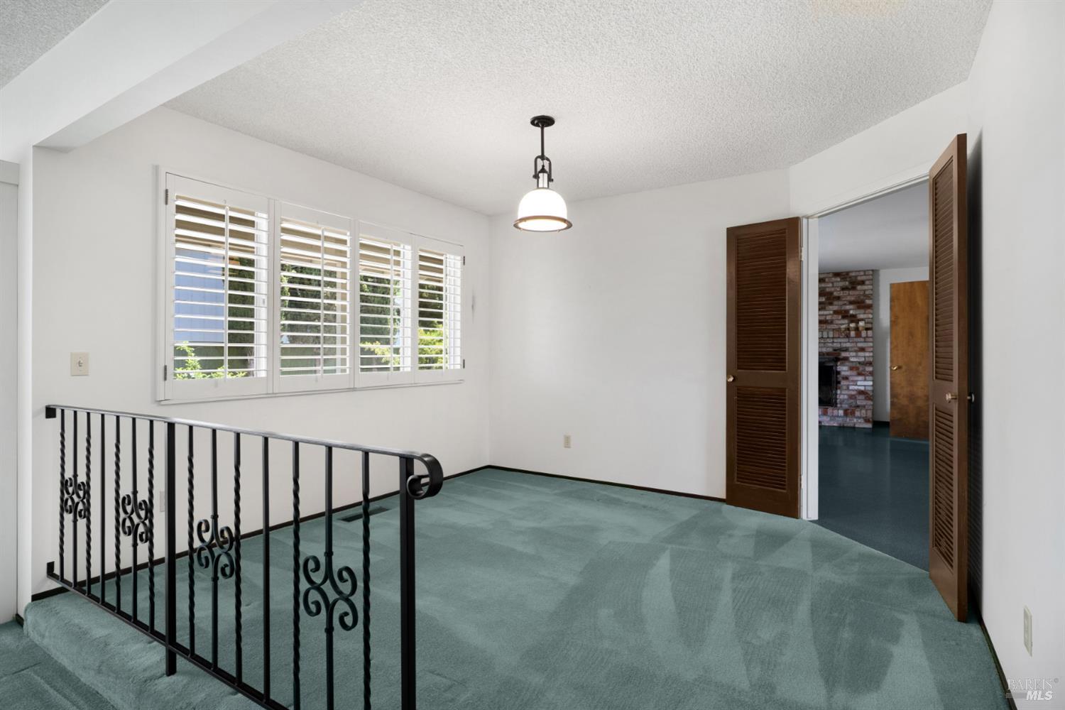 2904 Jason Drive Santa Rosa, CA 95405 - Photo 10 of 33 a view of an empty room with wooden floor and a window