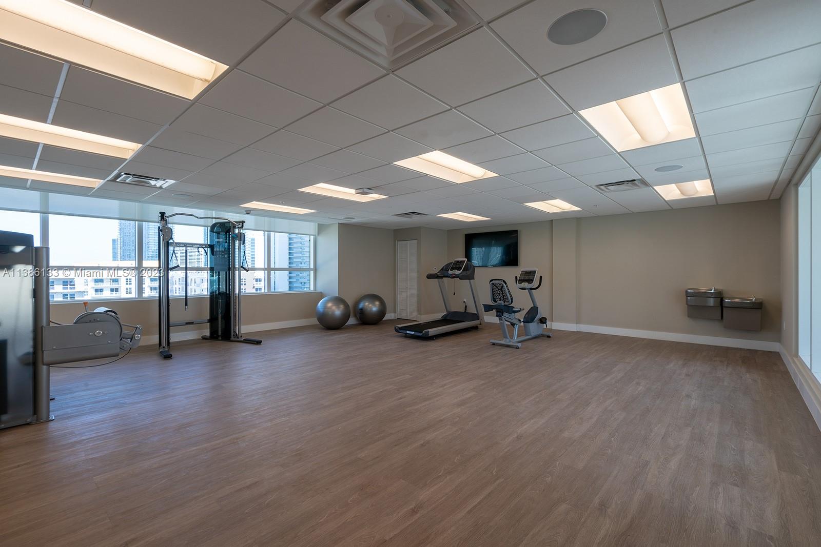321 Northeast 26th Street, Unit 615 Miami, FL 33137 - Photo 15 of 15 a view of a room with gym equipment