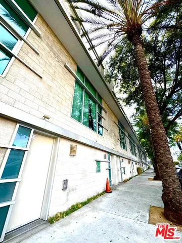 a living room with fireplace furniture and a flat screen tv