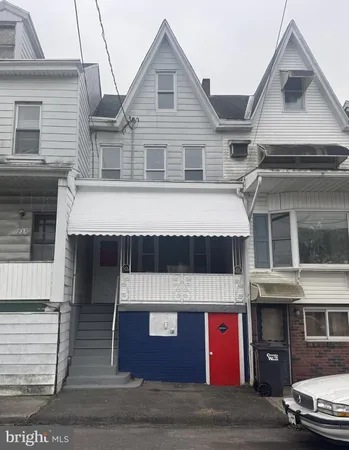 a front view of a house with a garage