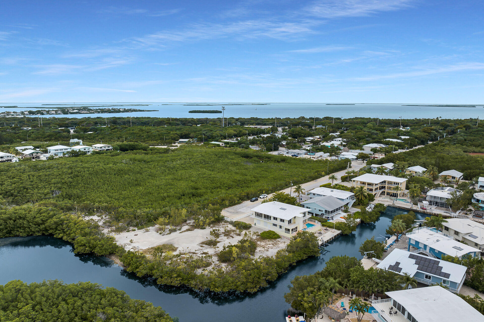 85 Ocean Shores Drive Key Largo, FL 33037 - Photo 13 of 77 an aerial view of residential houses with outdoor space