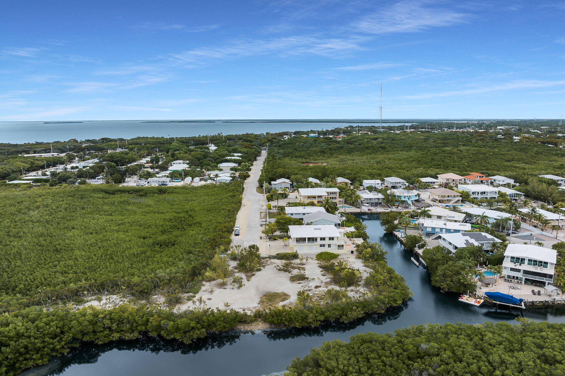 85 Ocean Shores Drive Key Largo, FL 33037 - Photo 14 of 77 an aerial view of residential houses with outdoor space