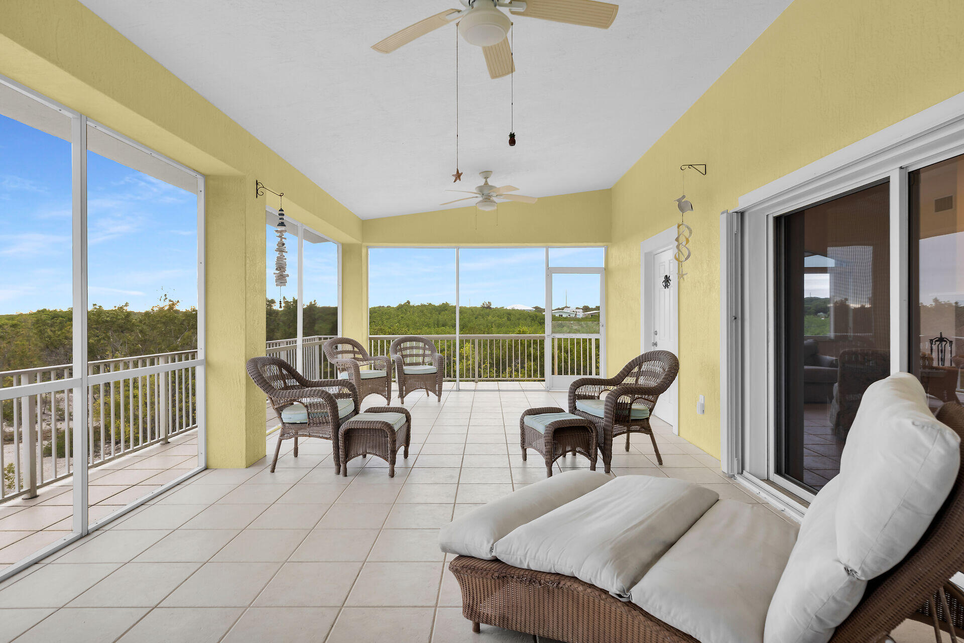 85 Ocean Shores Drive Key Largo, FL 33037 - Photo 38 of 77 a living room with furniture and large windows