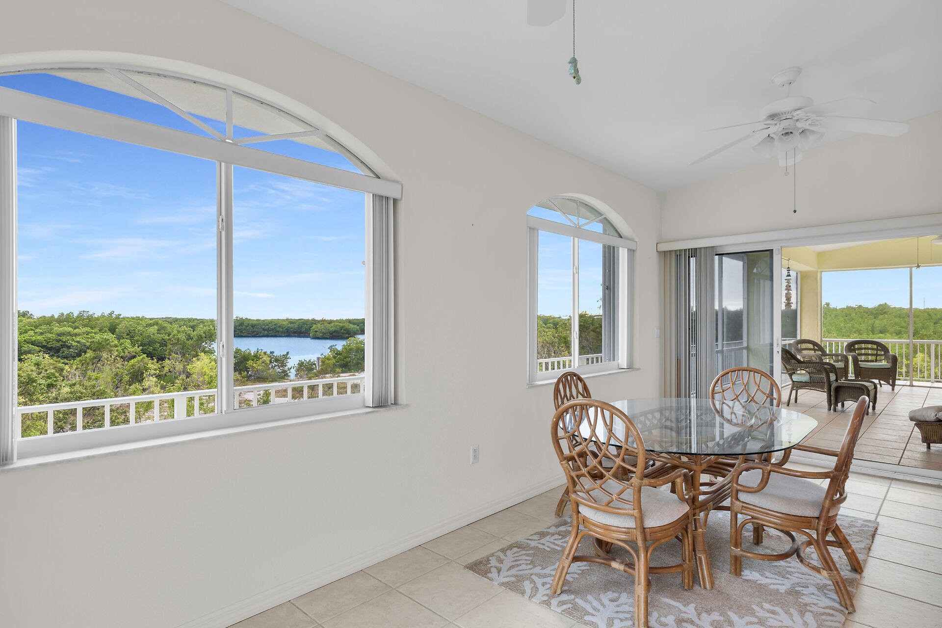 85 Ocean Shores Drive Key Largo, FL 33037 - Photo 48 of 77 a dining room with furniture and window