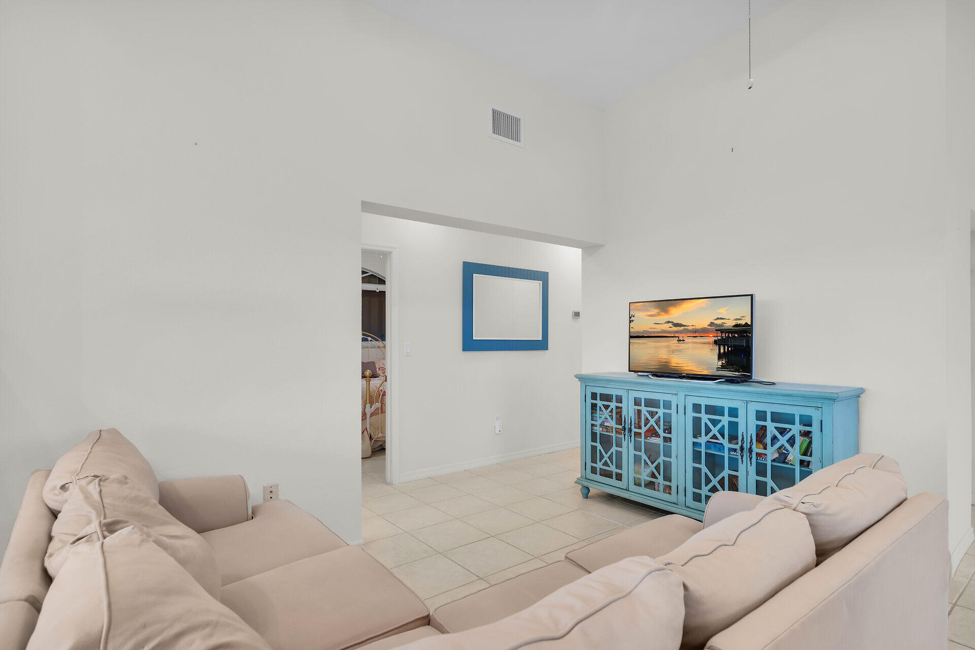 85 Ocean Shores Drive Key Largo, FL 33037 - Photo 52 of 77 a living room with furniture and a flat screen tv