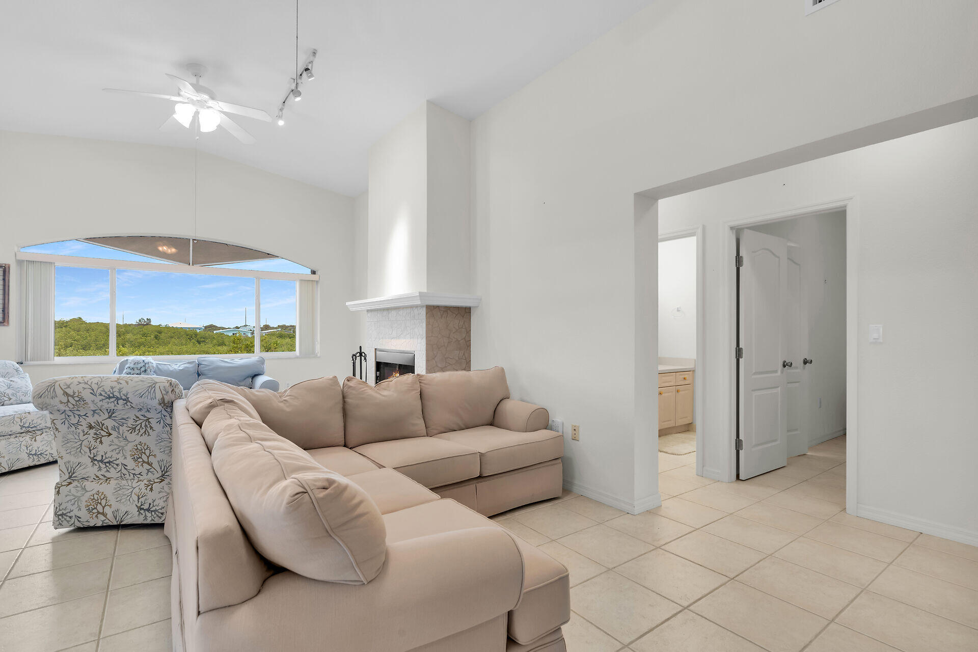 85 Ocean Shores Drive Key Largo, FL 33037 - Photo 53 of 77 a living room with furniture and a large window