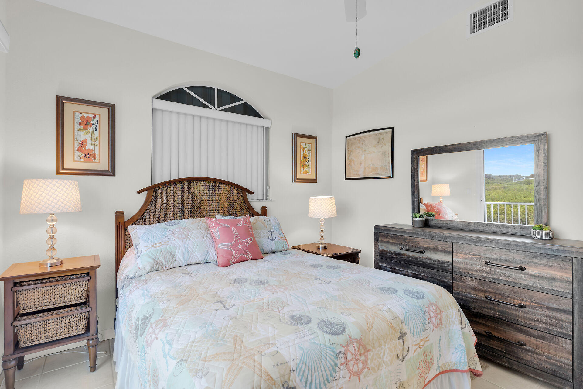 85 Ocean Shores Drive Key Largo, FL 33037 - Photo 60 of 77 a bedroom with a bed and a dresser