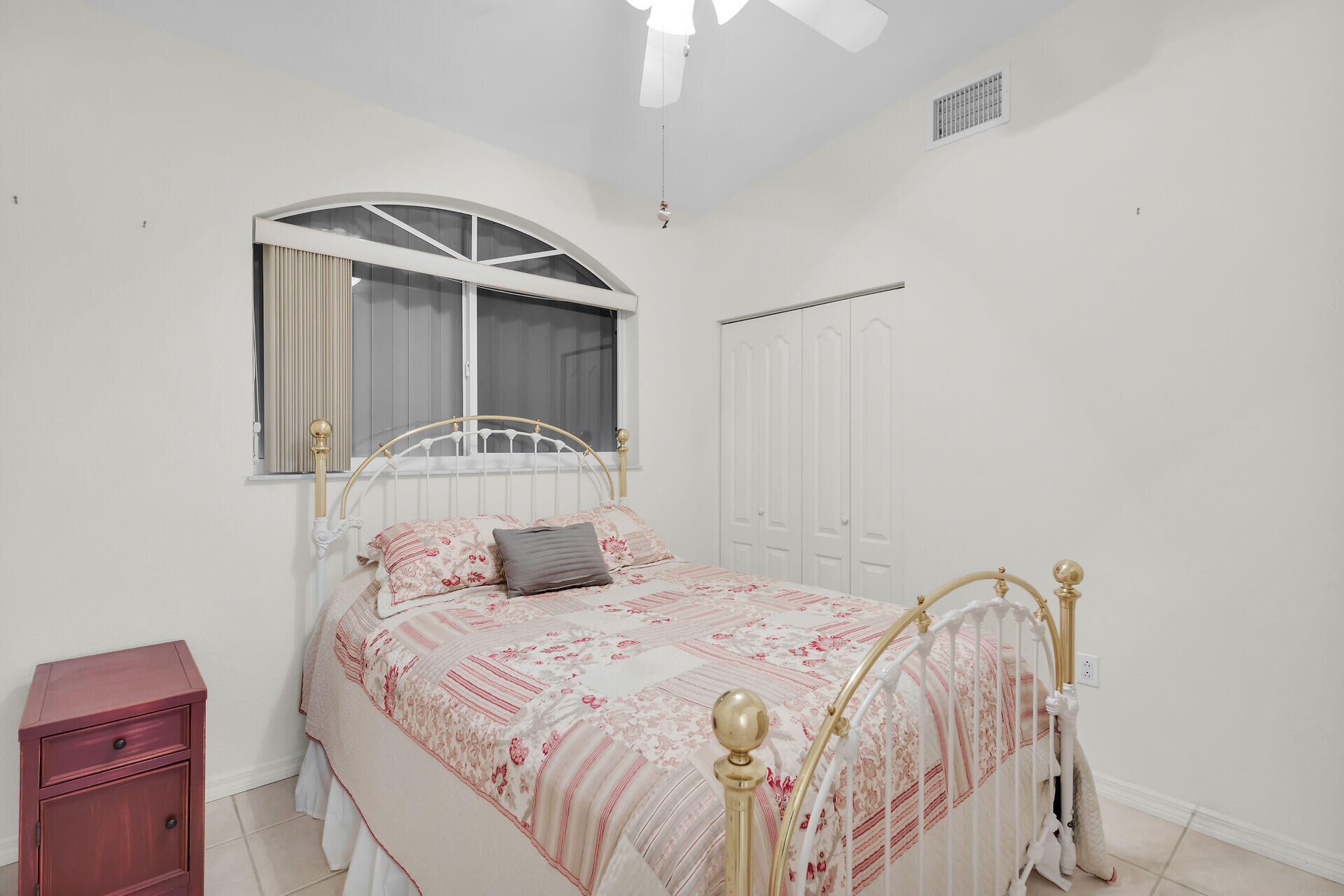 85 Ocean Shores Drive Key Largo, FL 33037 - Photo 64 of 77 a bedroom with a bed and a window