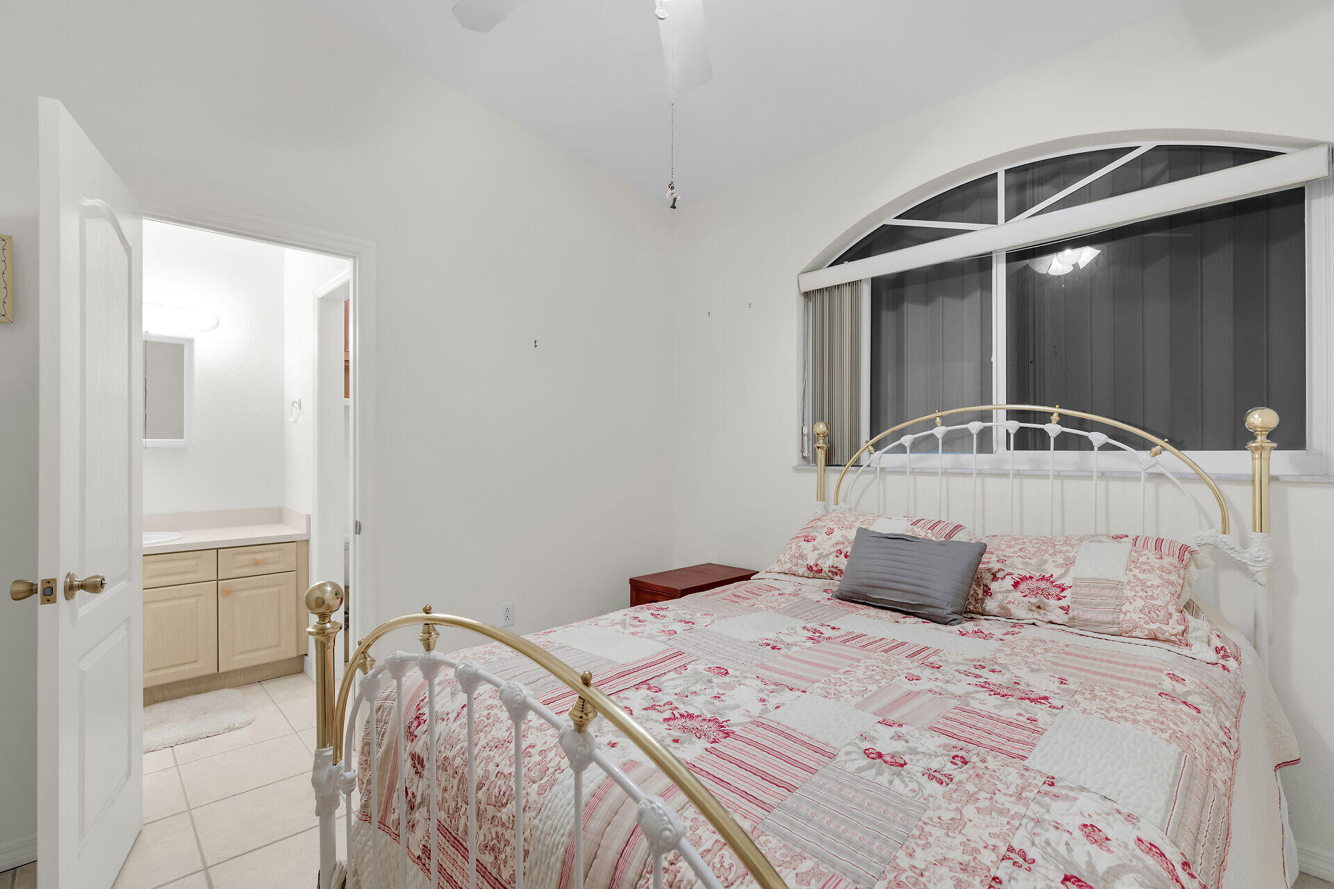 85 Ocean Shores Drive Key Largo, FL 33037 - Photo 65 of 77 a bedroom with a bed and a window