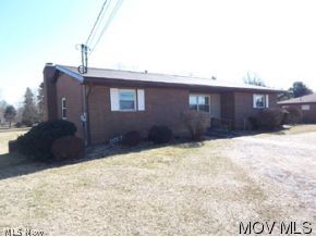 1183 Dupont Road Washington, WV 26181 - Photo 4 of 12 front L.side