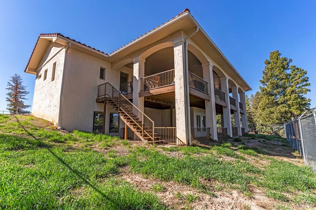 8760 Ridge Road Beulah, CO 81023 - Photo 6 of 45 a view of a house with backyard and garden