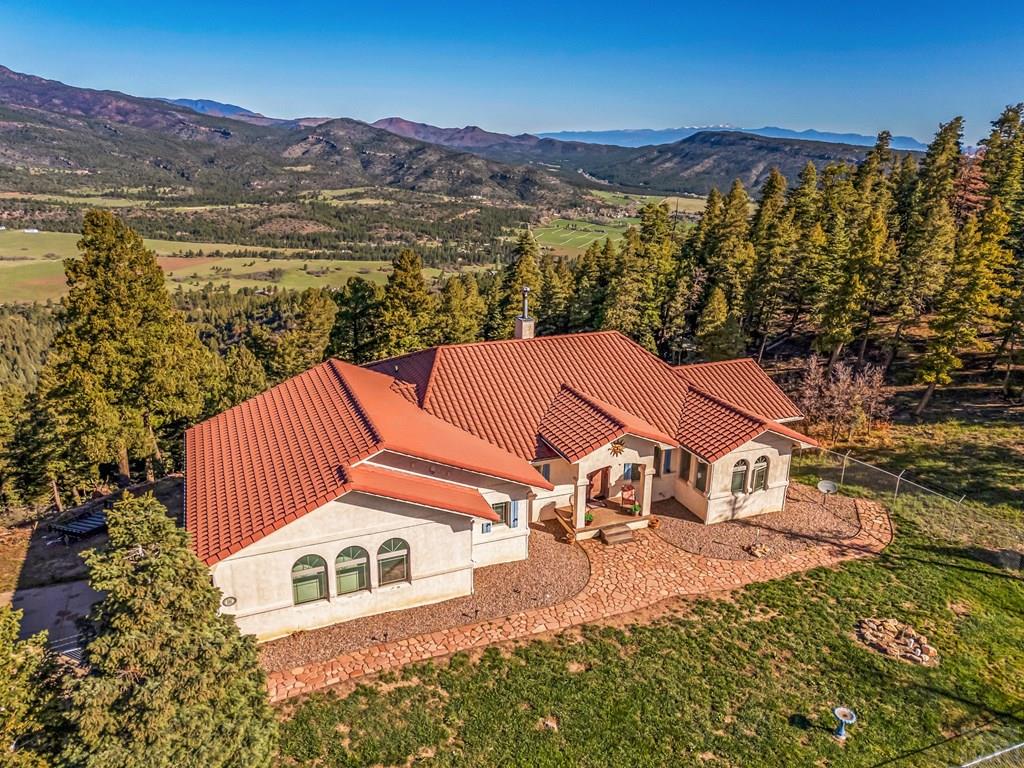 8760 Ridge Road Beulah, CO 81023 - Photo 9 of 45 a view of a house with a ocean view