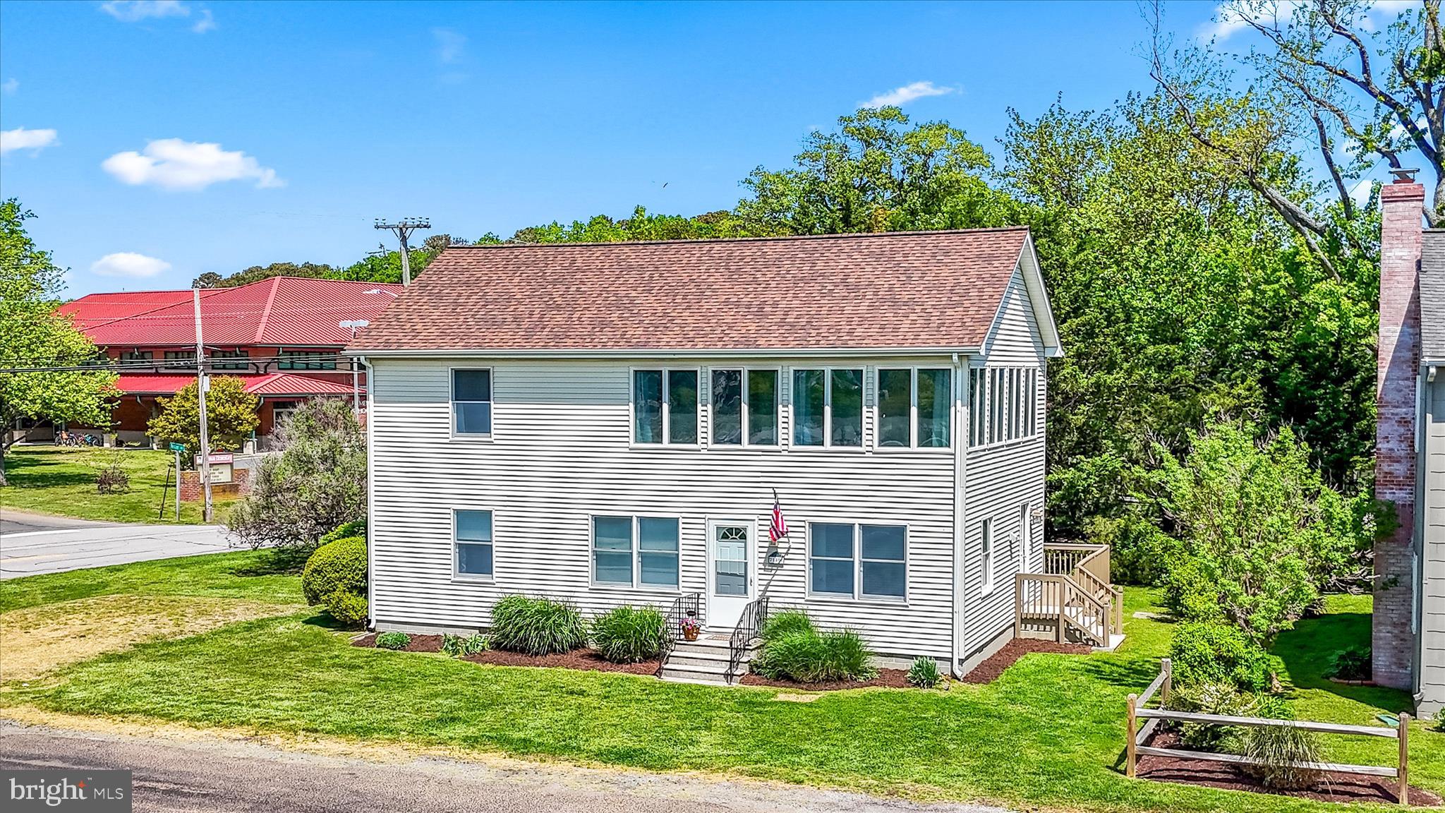21406 Dogwood Cove Road Tilghman, MD 21671 - Photo 59 of 68 a front view of a house with a yard