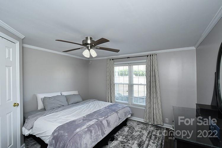 216 Jones Road Mocksville, NC 27028 - Photo 15 of 48 a bedroom with a bed and a window