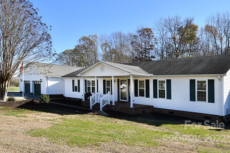 216 Jones Road Mocksville, NC 27028 - Photo 3 of 48 a front view of a house with a yard
