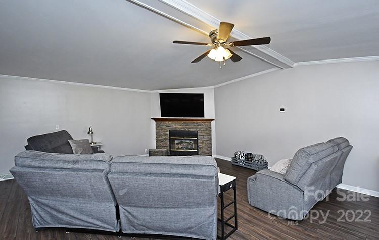 216 Jones Road Mocksville, NC 27028 - Photo 7 of 48 a living room with furniture and a flat screen tv