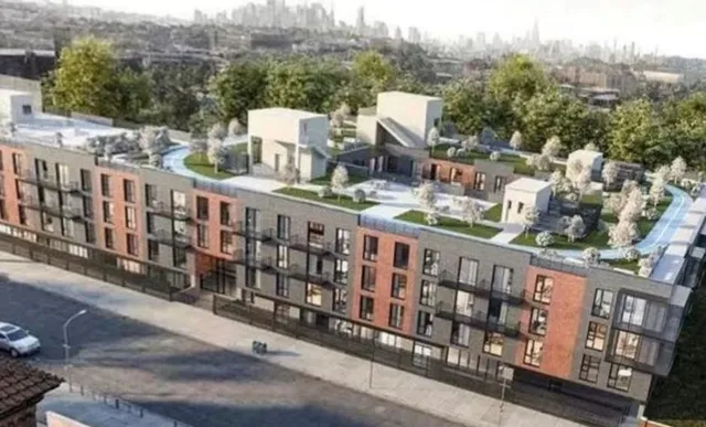 a terrace with outdoor seating and city view