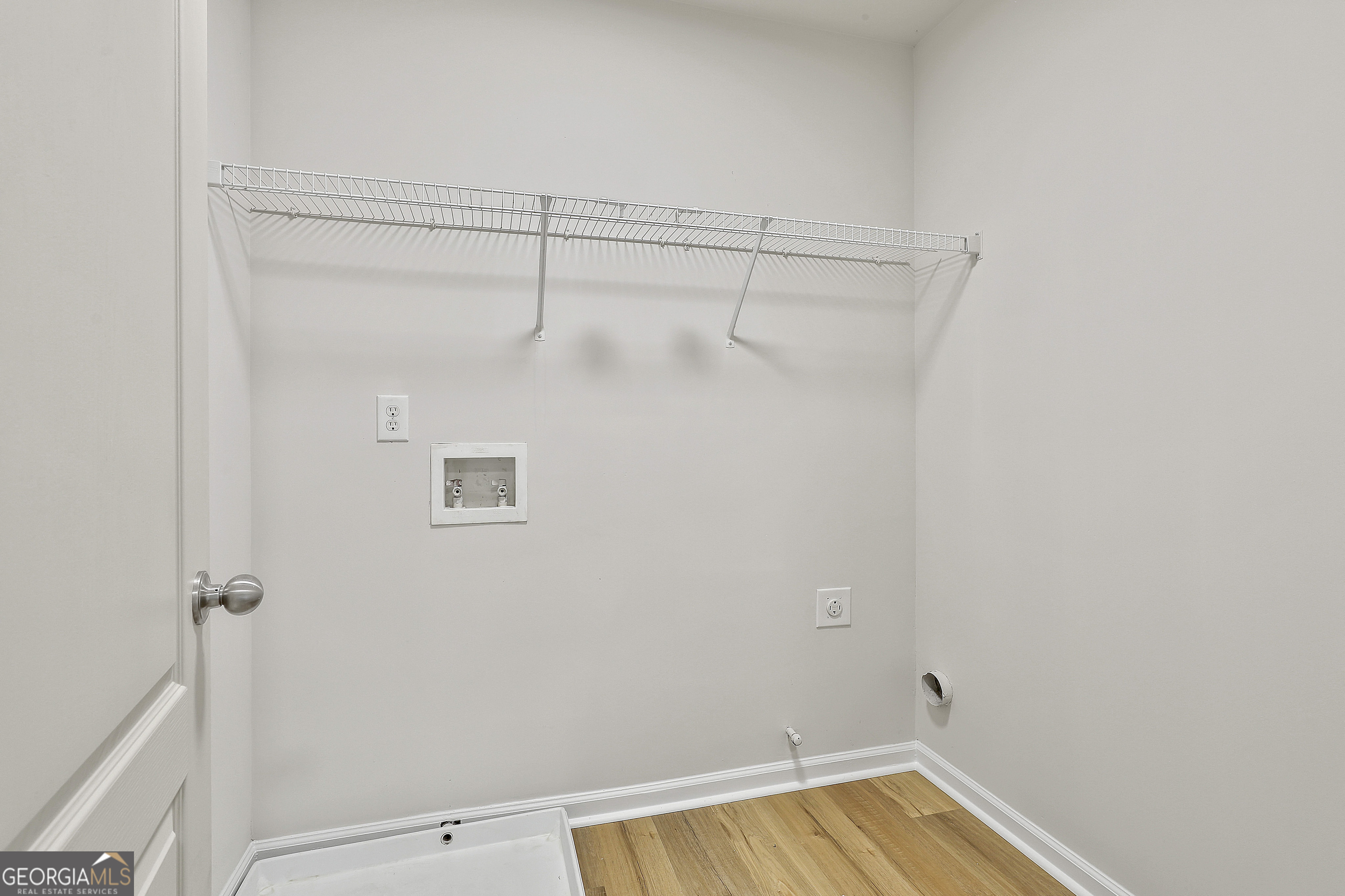 28 Fox Ridge Drive Newnan, GA 30265 - Photo 34 of 47 a view of a room with racks on the wall