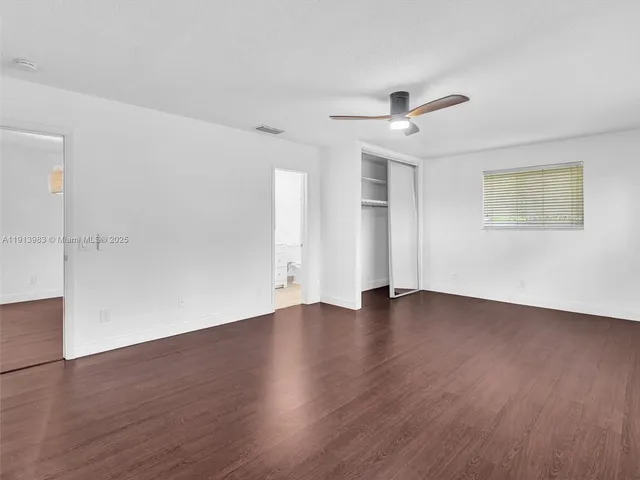 a view of an empty room with window