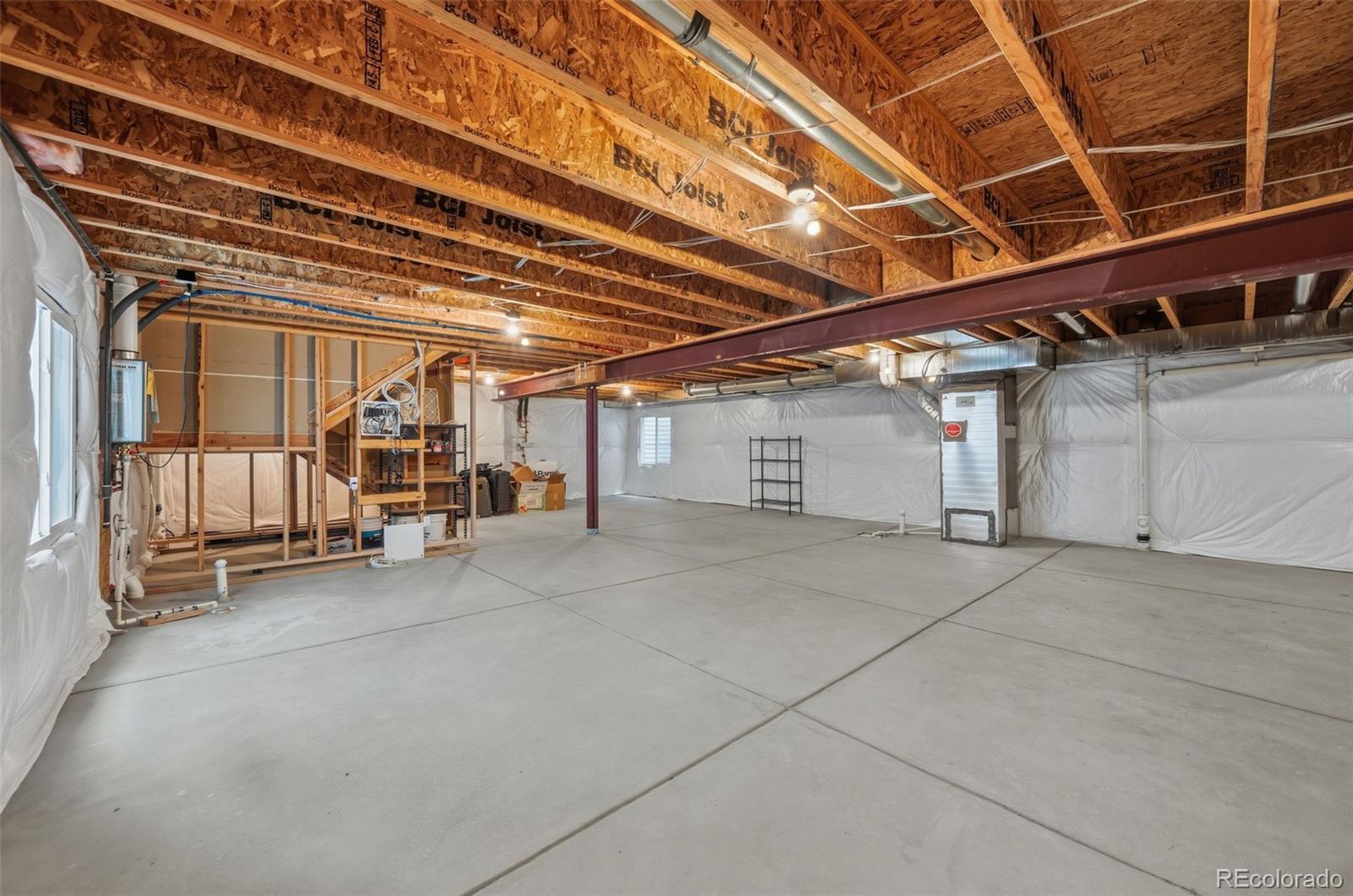 9602 Dunning Circle Highlands Ranch, CO 80126 - Photo 43 of 50 a view of an empty room with wooden roof