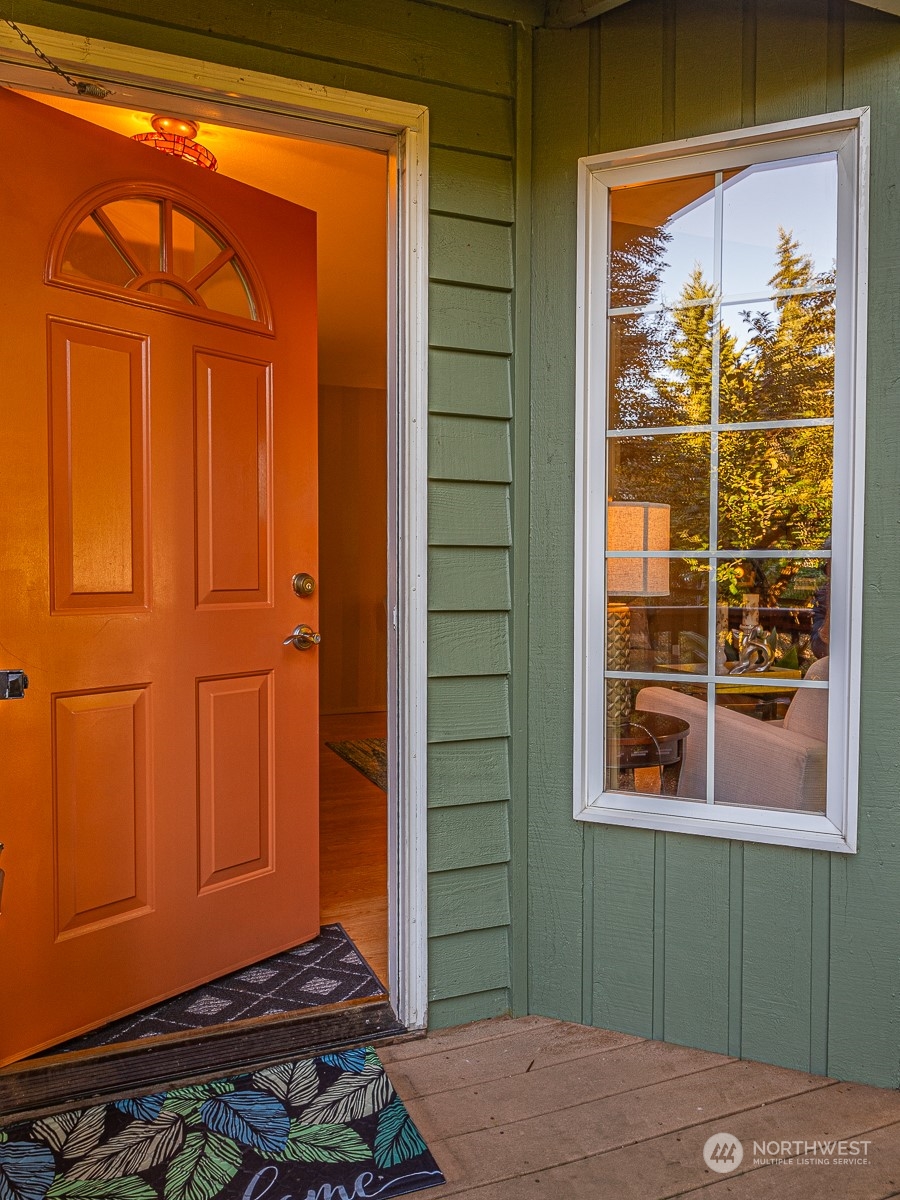 21425 Damson Road Bothell, WA 98021 - Photo 5 of 25 a front view of a house with a large window