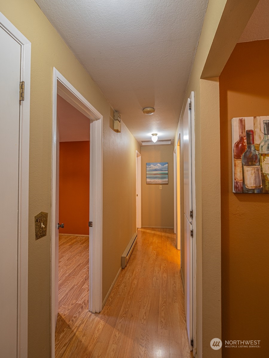 21425 Damson Road Bothell, WA 98021 - Photo 7 of 25 a view of hallway with a hallway