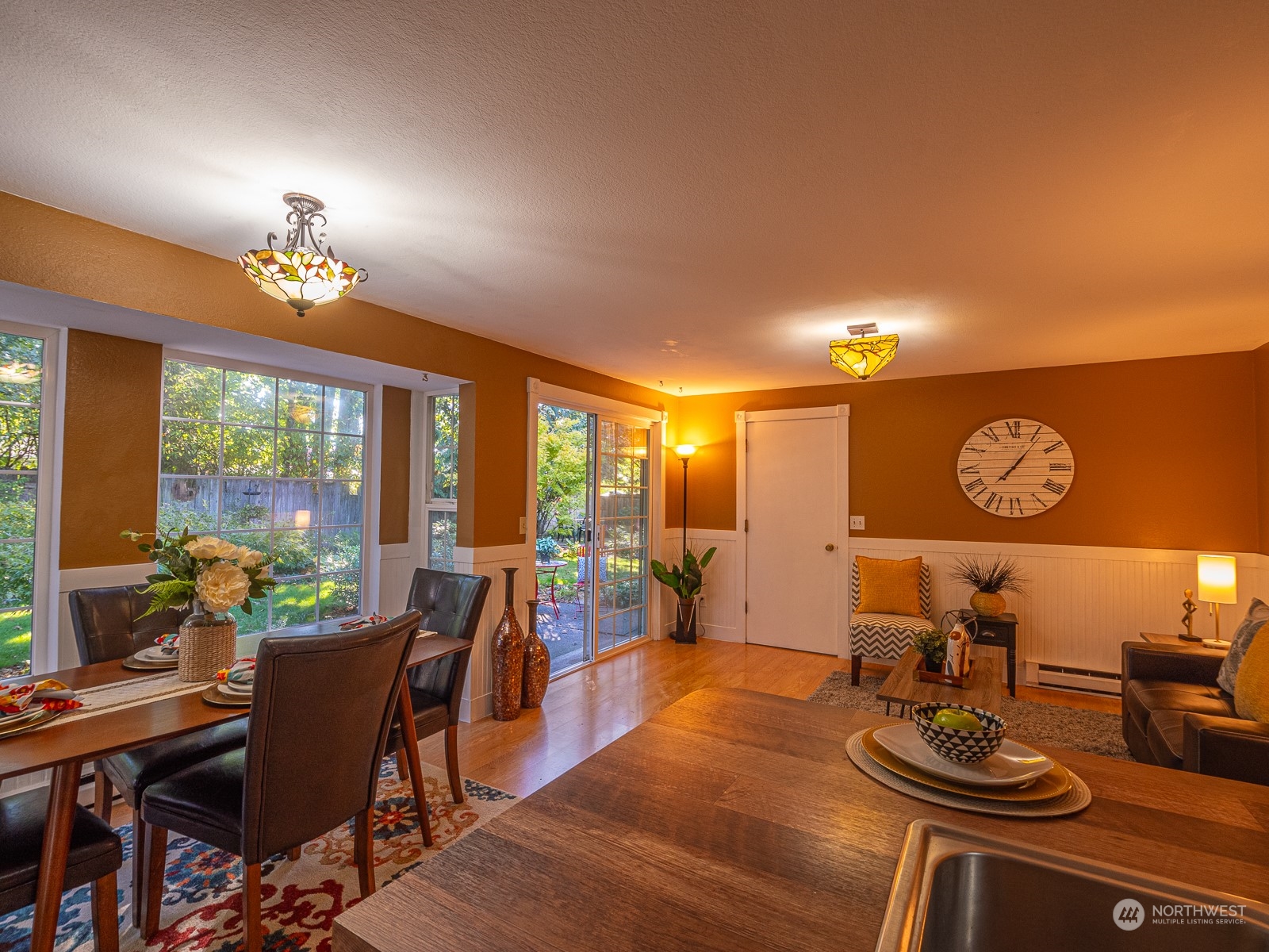 21425 Damson Road Bothell, WA 98021 - Photo 8 of 25 a view of a dining room with furniture window and outside view