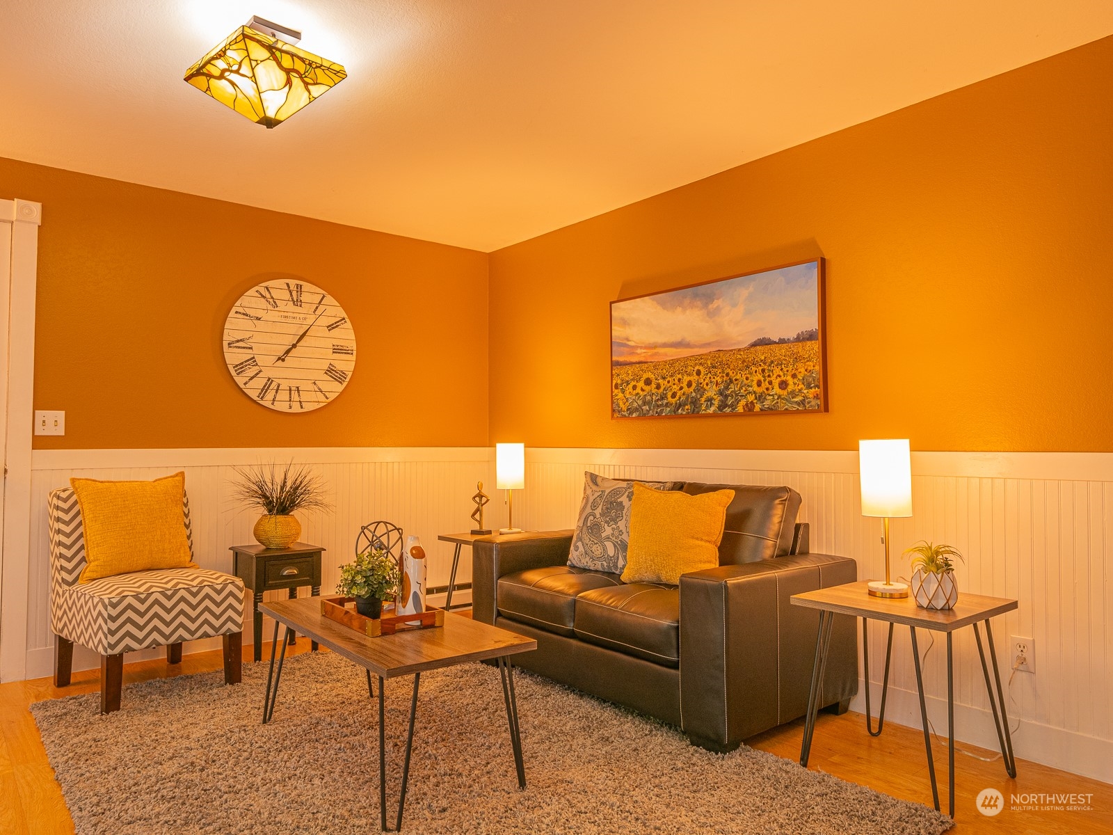 21425 Damson Road Bothell, WA 98021 - Photo 9 of 25 a living room with furniture and a table