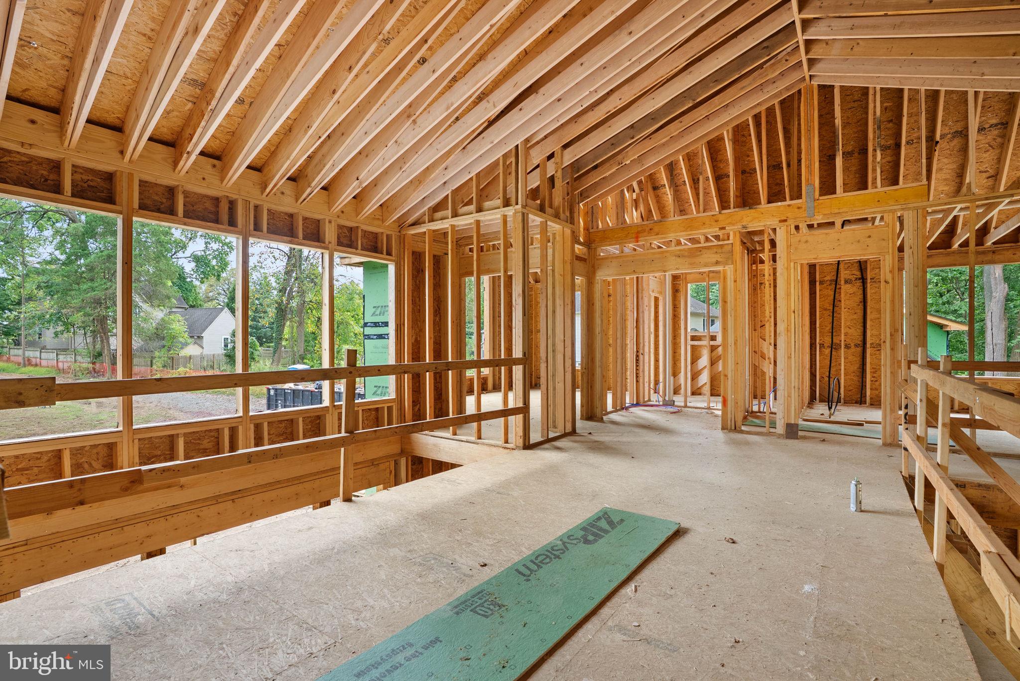 410 Sandy Bank Road Media, PA 19063 - Photo 11 of 32 a swimming pool with large glass windows and painted walls