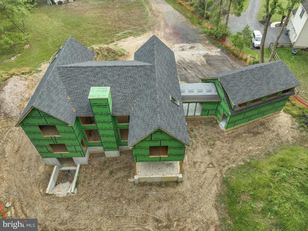 410 Sandy Bank Road Media, PA 19063 - Photo 12 of 32 a backyard of a house with seating space