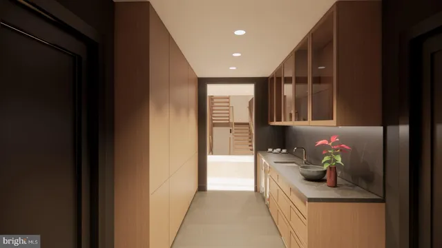 a kitchen with a refrigerator and a sink