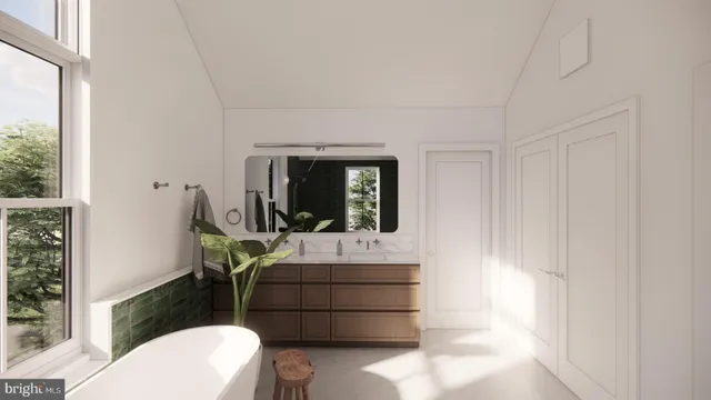 a bed room with a bed window and a flat screen tv