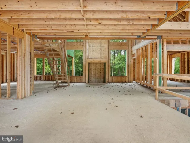 a view of a room with a large window
