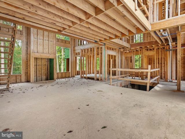 a view of an empty room with a balcony
