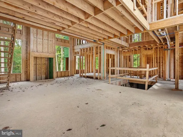 a view of an empty room with a balcony