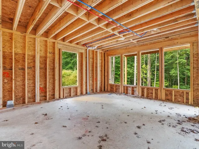 a view of a room with large windows