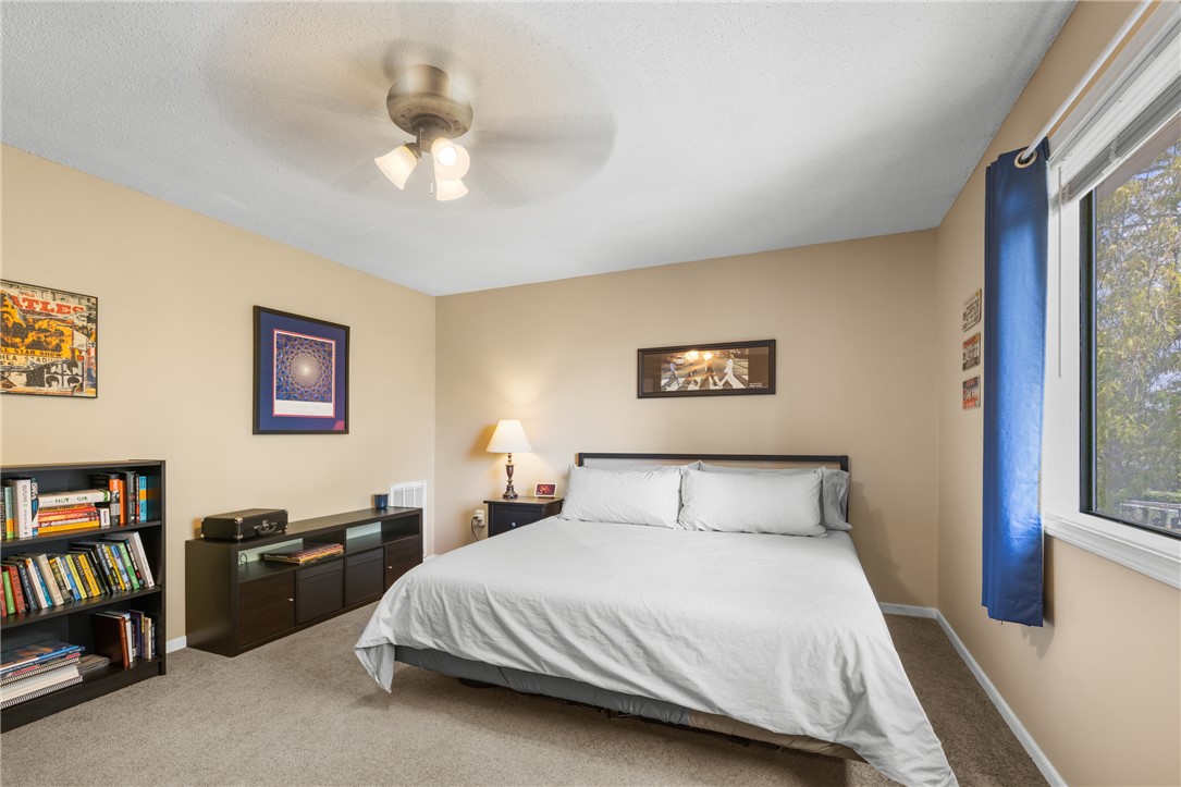 119 Freedom Drive, Unit 8 Clemson, SC 29631 - Photo 19 of 39 Comfortable bedroom with natural light and carpeting.