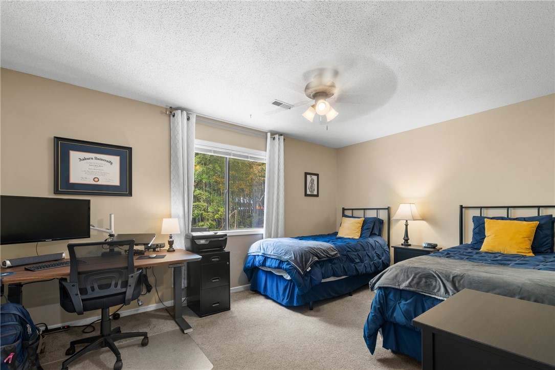 119 Freedom Drive, Unit 8 Clemson, SC 29631 - Photo 22 of 39 This inviting bedroom provides a comfortable and functional living space.