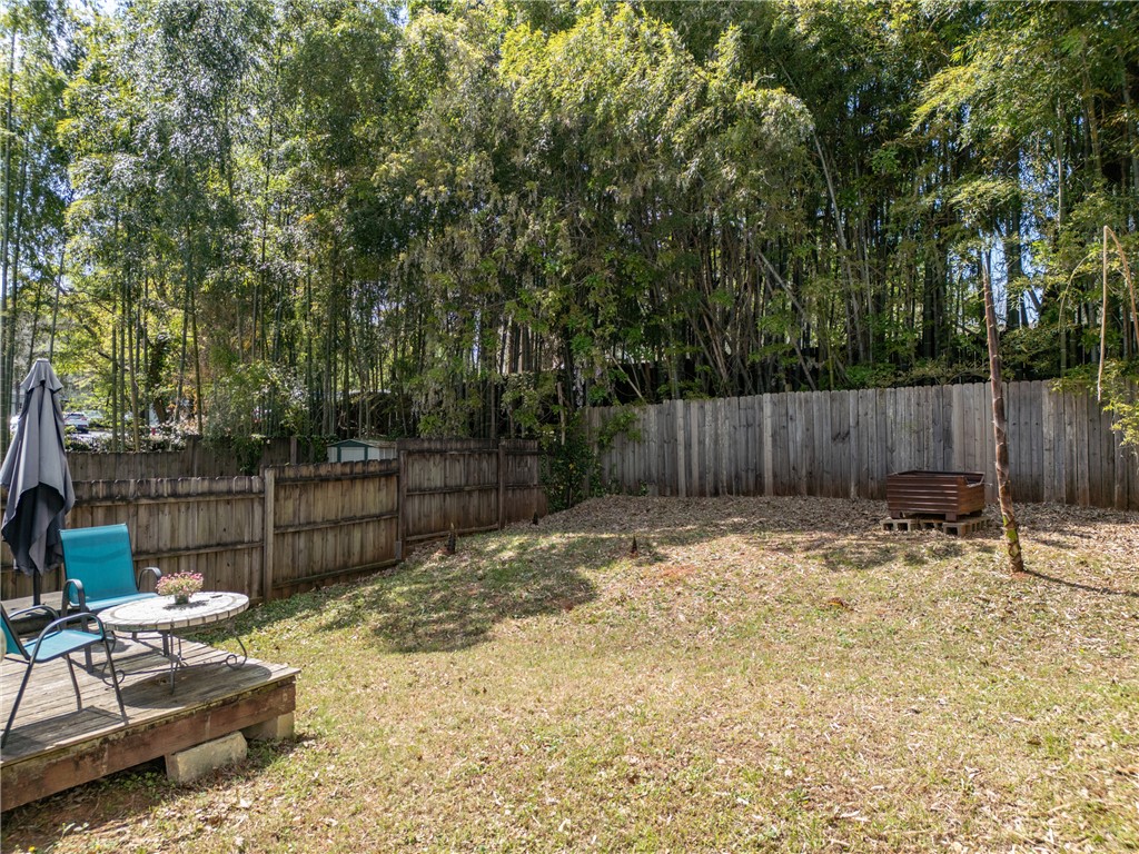 119 Freedom Drive, Unit 8 Clemson, SC 29631 - Photo 27 of 39 This spacious backyard offers a private outdoor retreat with a welcoming deck.