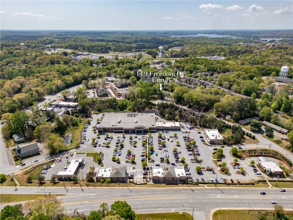 119 Freedom Drive, Unit 8 Clemson, SC 29631 - Photo 32 of 39 An aerial perspective reveals a vibrant commercial and residential landscape nestled amidst verdant surroundings.