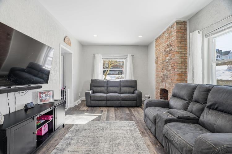 31 Harrison Street Pittsburgh, PA 15205 - Photo 3 of 27 a living room with furniture and a flat screen tv
