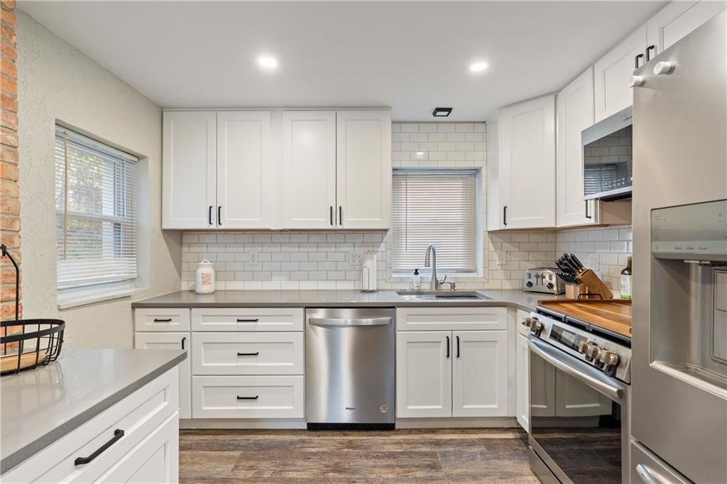 31 Harrison Street Pittsburgh, PA 15205 - Photo 7 of 27 a kitchen with granite countertop cabinets stainless steel appliances and a sink