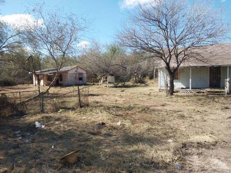 2012 2nd Ln Circle Mission, TX 78572 - Photo 3 of 5 a backyard of a house with large trees