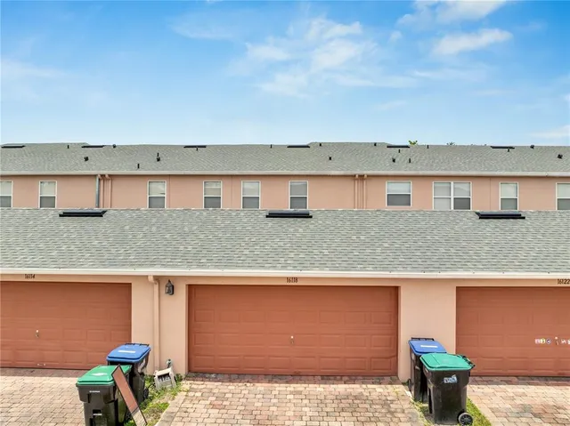 a view of a terrace with chairs