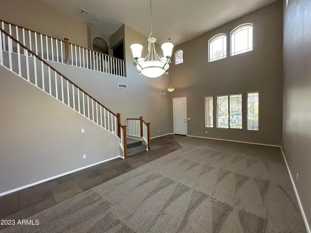 a view of livingroom with hardwood floor and hallway